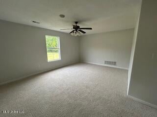 134 Shadow Ln, Batesville, MS 38606 - empty room featuring ceiling fan, carpet floors, and baseboards