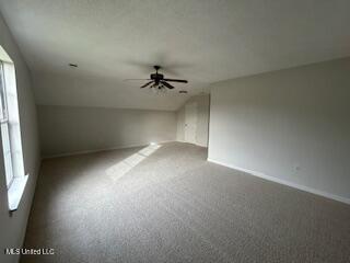 134 Shadow Ln, Batesville, MS 38606 - additional living space with ceiling fan, baseboards, and carpet