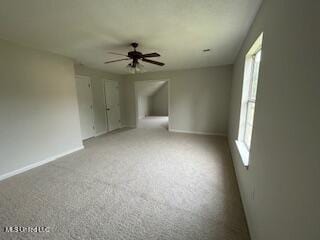 134 Shadow Ln, Batesville, MS 38606 - carpeted empty room with ceiling fan and baseboards