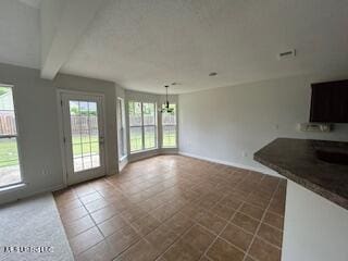 134 Shadow Ln, Batesville, MS 38606 - unfurnished dining area with beamed ceiling