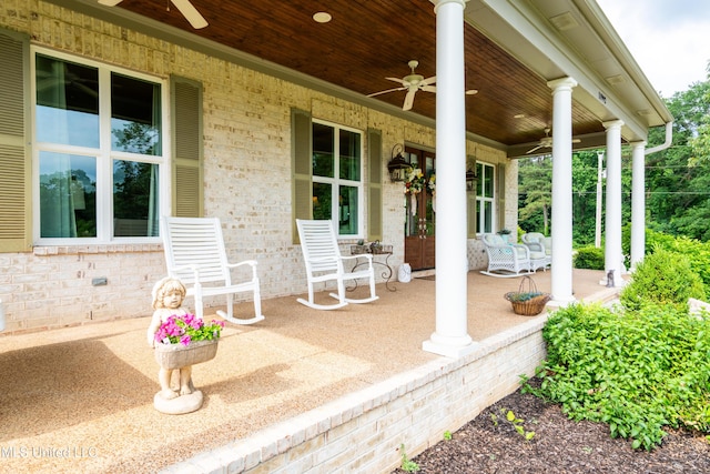 view of patio featuring french doors, a porch, and a ceiling fan