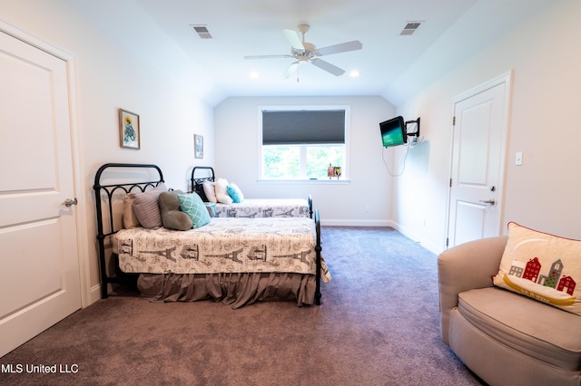 bedroom with lofted ceiling, baseboards, visible vents, and carpet