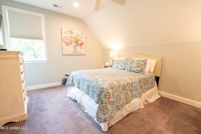 carpeted bedroom featuring lofted ceiling, visible vents, ceiling fan, and baseboards