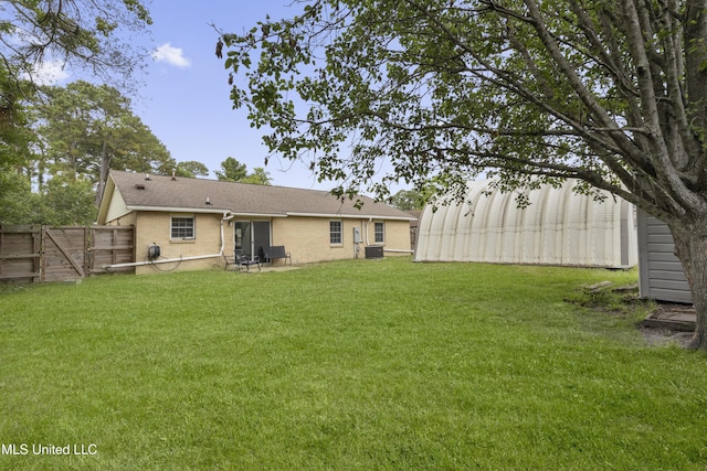 12509 Ponce De Leon Dr, Ocean Springs, MS 39564 - view of yard with a gate, fence, and central AC