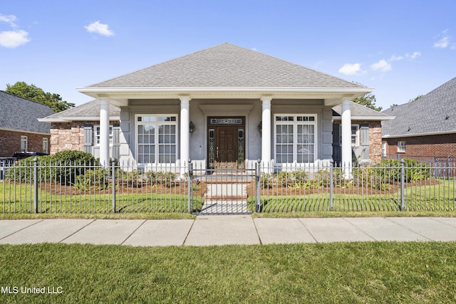 1529 Magnolia St Unit 15, Gulfport, MS 39507 - bungalow-style house featuring a porch, roof with shingles, and a gate