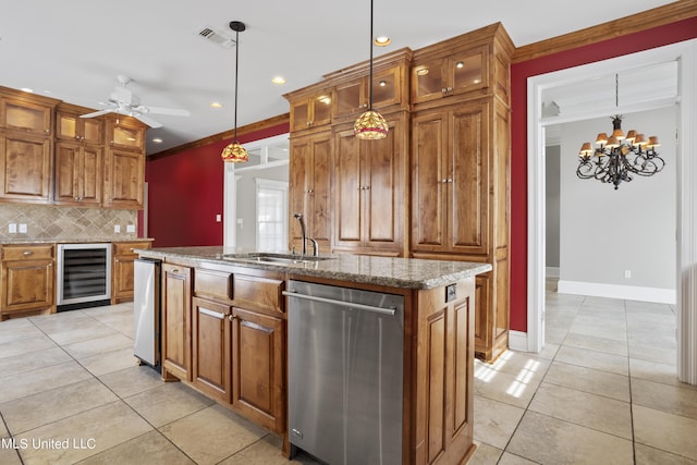 1529 Magnolia St Unit 15, Gulfport, MS 39507 - kitchen with beverage cooler, dishwasher, a sink, crown molding, and a kitchen island with sink