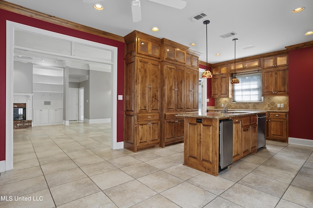 1529 Magnolia St Unit 15, Gulfport, MS 39507 - kitchen with light tile patterned floors, backsplash, a sink, recessed lighting, and light stone countertops