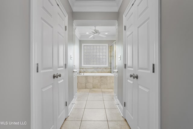 1529 Magnolia St Unit 15, Gulfport, MS 39507 - full bath featuring ornamental molding, ceiling fan, tiled bath, tile patterned floors, and a shower