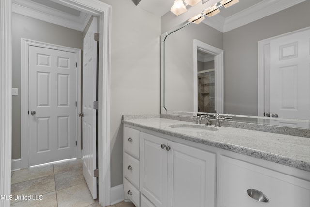 1529 Magnolia St Unit 15, Gulfport, MS 39507 - full bath featuring vanity, crown molding, baseboards, and a tile shower