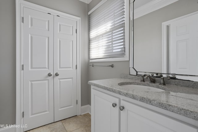 1529 Magnolia St Unit 15, Gulfport, MS 39507 - bathroom featuring vanity, ornamental molding, and baseboards