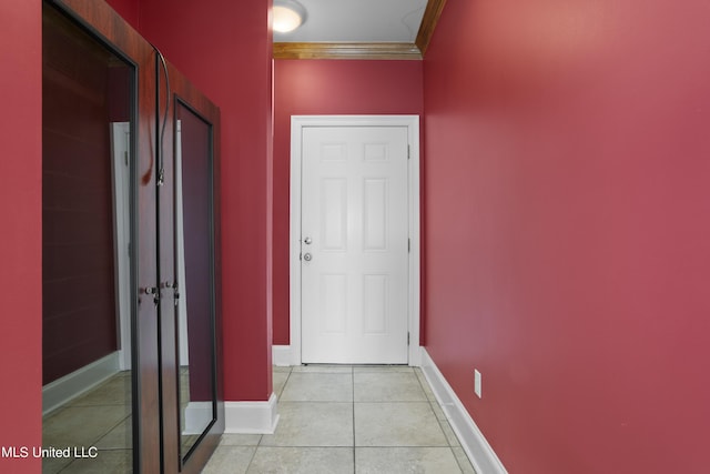 1529 Magnolia St Unit 15, Gulfport, MS 39507 - corridor featuring light tile patterned floors, baseboards, and crown molding