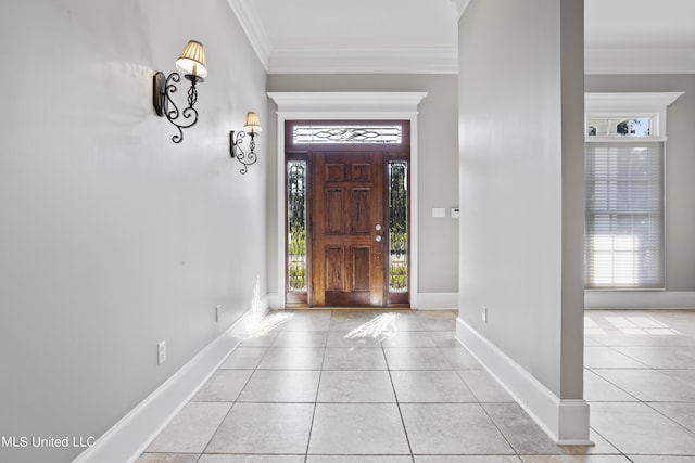 1529 Magnolia St Unit 15, Gulfport, MS 39507 - foyer featuring plenty of natural light, crown molding, light tile patterned floors, and baseboards