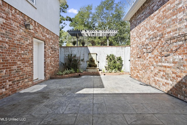 1529 Magnolia St Unit 15, Gulfport, MS 39507 - view of patio / terrace featuring a pergola