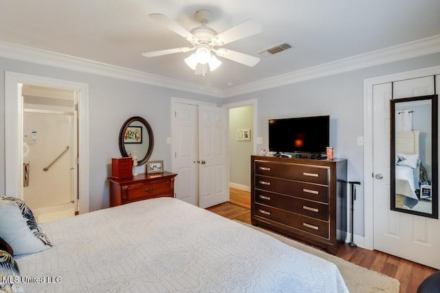 bedroom with ceiling fan, ornamental molding, and light hardwood / wood-style flooring