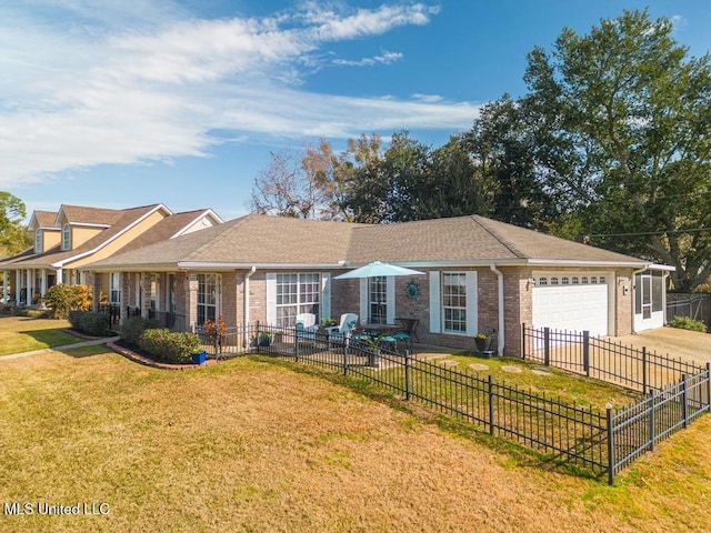 single story home featuring a garage and a front lawn