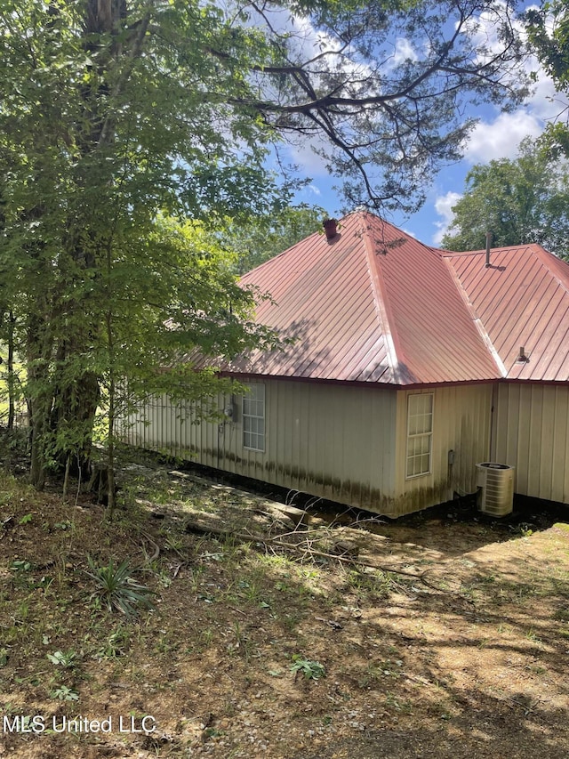 20 Cedar Hts, Pope, MS 38658 - view of home's exterior featuring metal roof and cooling unit