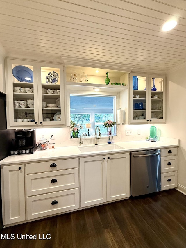 bar with stainless steel dishwasher, a sink, and dark wood-style floors