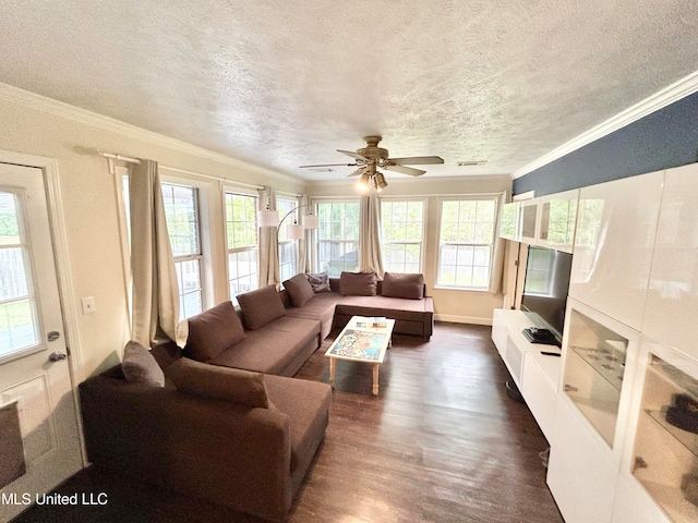 living room featuring ornamental molding, a textured ceiling, dark wood-type flooring, and ceiling fan