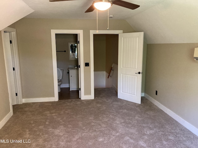 bonus room featuring a ceiling fan, carpet floors, vaulted ceiling, a wall unit AC, and baseboards