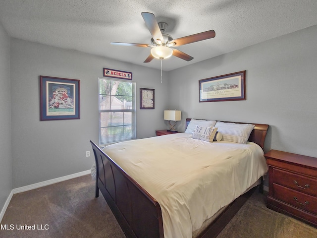 881 Brentwood Dr, Biloxi, MS 39532 - bedroom featuring dark colored carpet, a textured ceiling, and ceiling fan