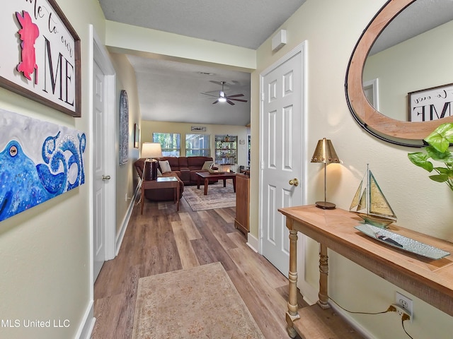 881 Brentwood Dr, Biloxi, MS 39532 - corridor with wood finished floors and baseboards
