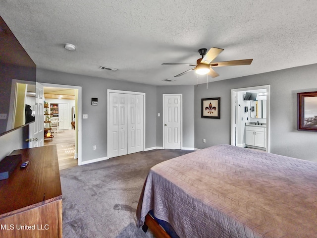 881 Brentwood Dr, Biloxi, MS 39532 - bedroom featuring carpet, a textured ceiling, and ceiling fan