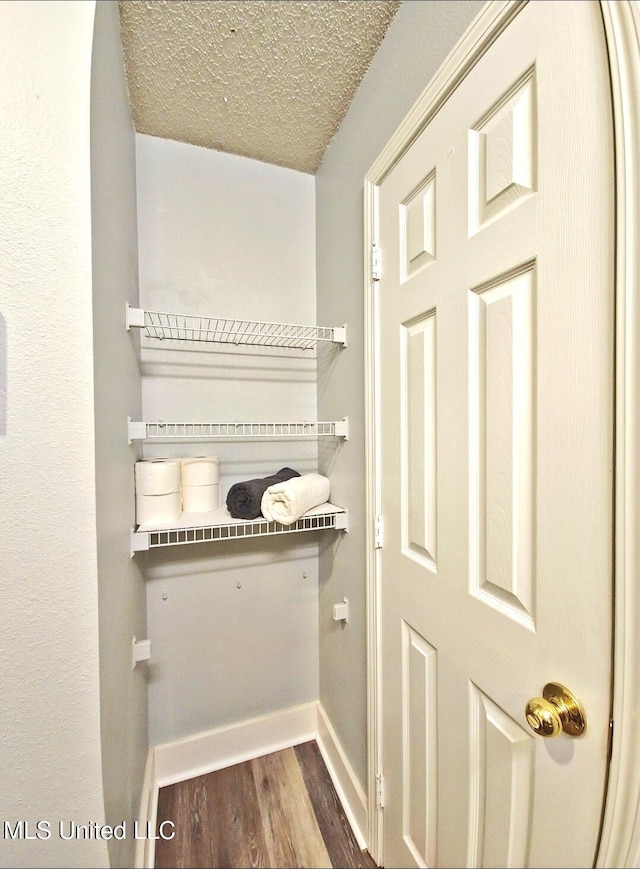 881 Brentwood Dr, Biloxi, MS 39532 - spacious closet featuring wood finished floors