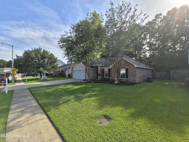 881 Brentwood Dr, Biloxi, MS 39532 - view of front facade featuring concrete driveway, an attached garage, and brick siding