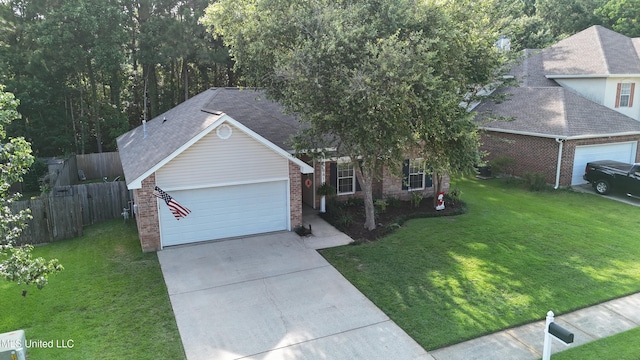 881 Brentwood Dr, Biloxi, MS 39532 - ranch-style house with brick siding, driveway, and an attached garage