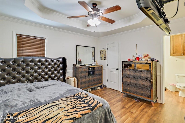 6 Laurie Cv, Byram, MS 39272 - bedroom with a tray ceiling, wood finished floors, ornamental molding, and a ceiling fan