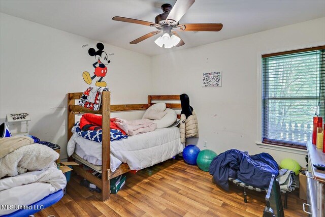 6 Laurie Cv, Byram, MS 39272 - bedroom featuring wood finished floors and a ceiling fan