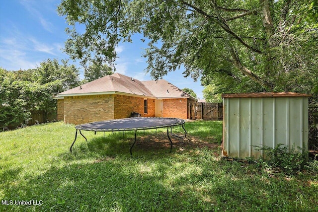 6 Laurie Cv, Byram, MS 39272 - view of yard with a trampoline