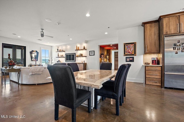 dining room with ceiling fan