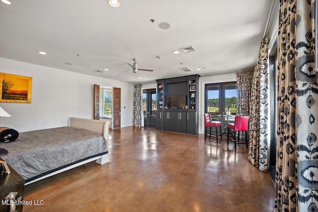 bedroom featuring access to outside and french doors