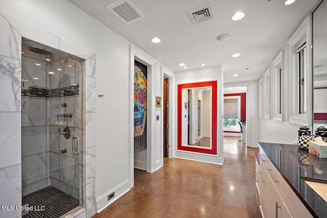 145 Republic St Unit 331, Madison, MS 39110 - bathroom featuring baseboards, a shower stall, recessed lighting, vanity, and concrete flooring