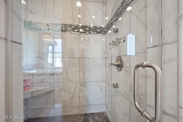 bathroom featuring an enclosed shower