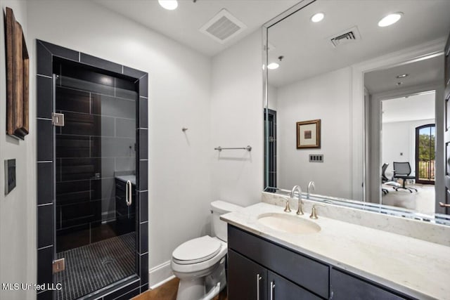 145 Republic St Unit 331, Madison, MS 39110 - bathroom featuring a shower stall, toilet, vanity, and recessed lighting