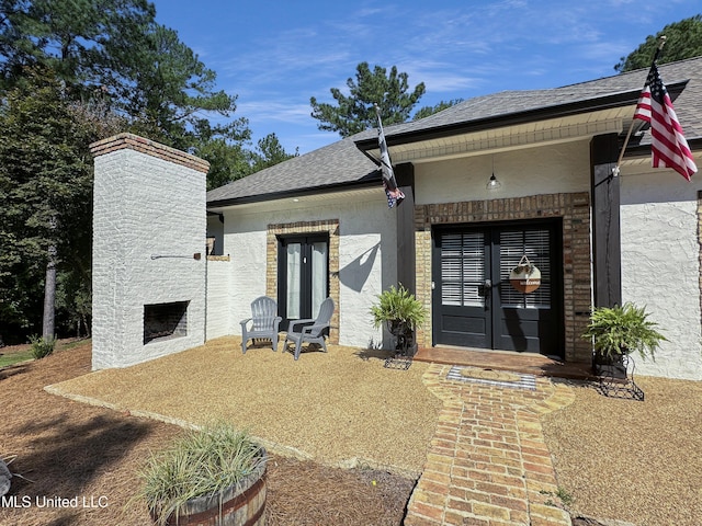 doorway to property featuring french doors