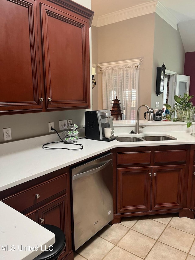 kitchen featuring light tile patterned floors, stainless steel dishwasher, ornamental molding, and sink