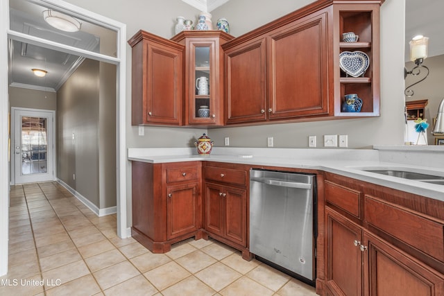 kitchen featuring stainless steel dishwasher, light tile patterned floors, and crown molding