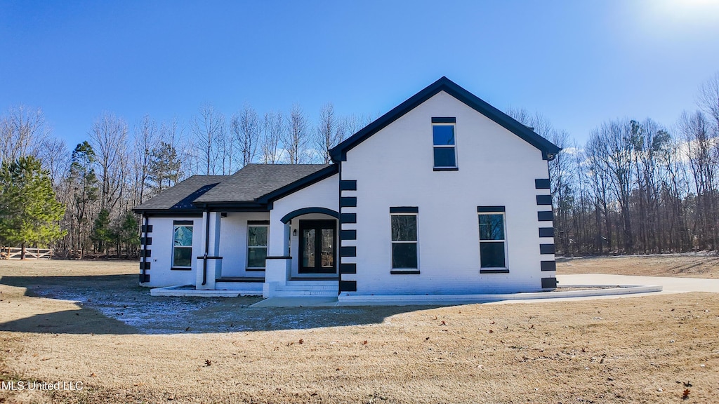 136 Lee Creek Cv, Byhalia, MS 38611 - view of front facade with a front lawn and french doors