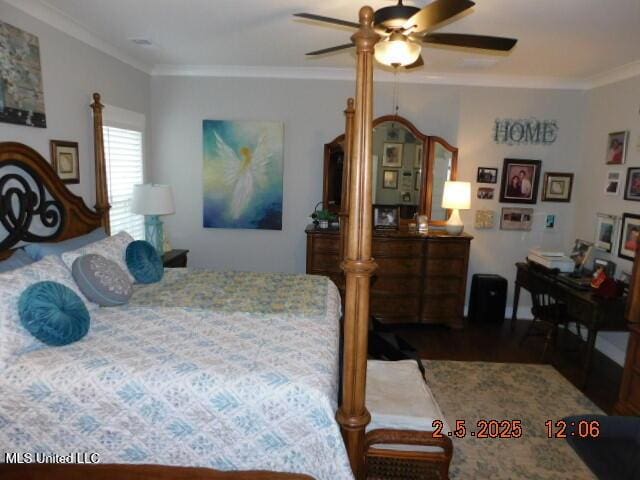 bedroom featuring ornamental molding and hardwood / wood-style floors