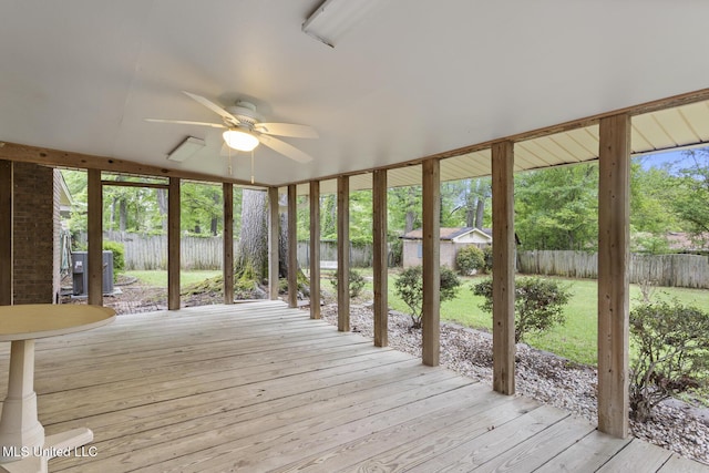 exterior space featuring ceiling fan