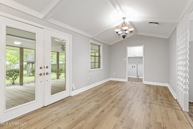 interior space featuring an inviting chandelier, light wood-type flooring, vaulted ceiling with beams, french doors, and baseboards