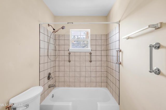 full bathroom featuring shower / tub combination and toilet