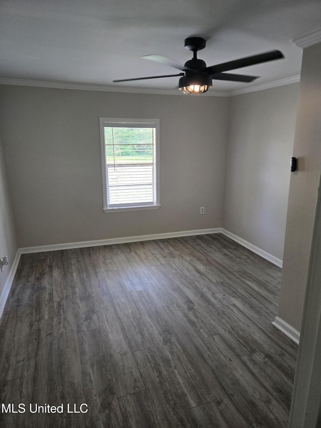783 Rising Star Rd, Holly Springs, MS 38635 - spare room with ornamental molding, ceiling fan, and dark wood-style flooring
