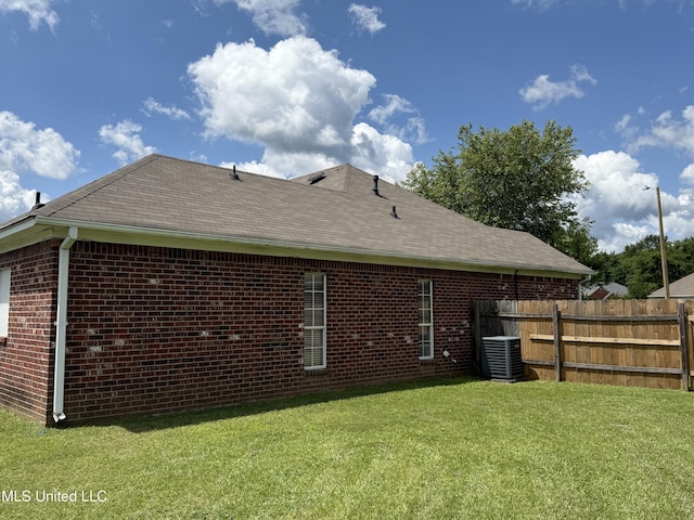 302 Chatfield Cv, Madison, MS 39110 - back of property with brick siding, a shingled roof, and cooling unit