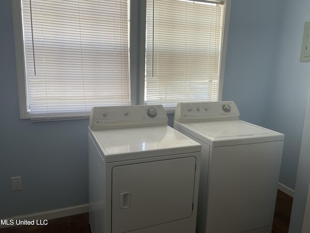 laundry room featuring washing machine and dryer