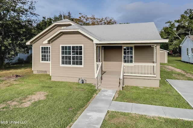 bungalow-style home with a porch and a front lawn