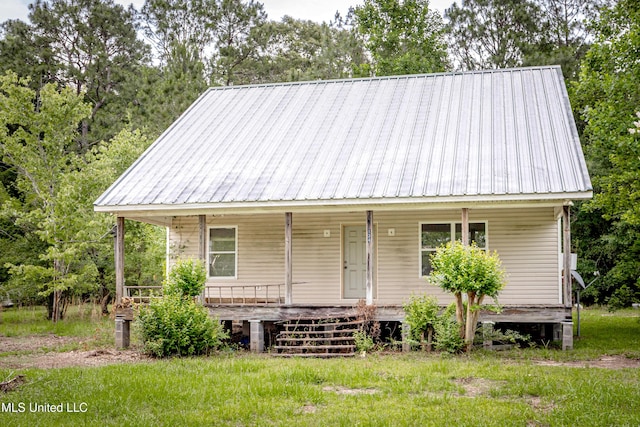 134 Lynne Ln, Lucedale, MS 39452 - view of front of house featuring covered porch and metal roof